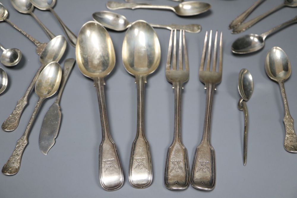 A group of assorted mainly 19th century silver flatware, including a set of six teaspoons by George Adams, London, 1877, 160z.